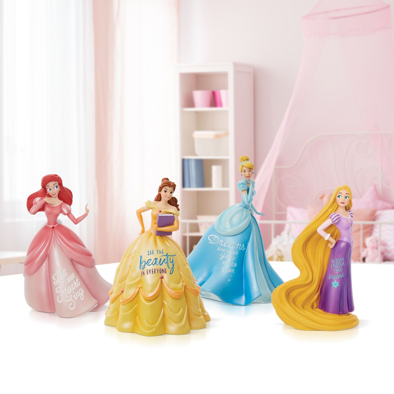 Tangled Rapunzel Wish Princess Expressions Figurine  Rapunzel from the hit Disney film 'Tangled' in an expressive pose with an empowering message that reads "Wish from the Heart"