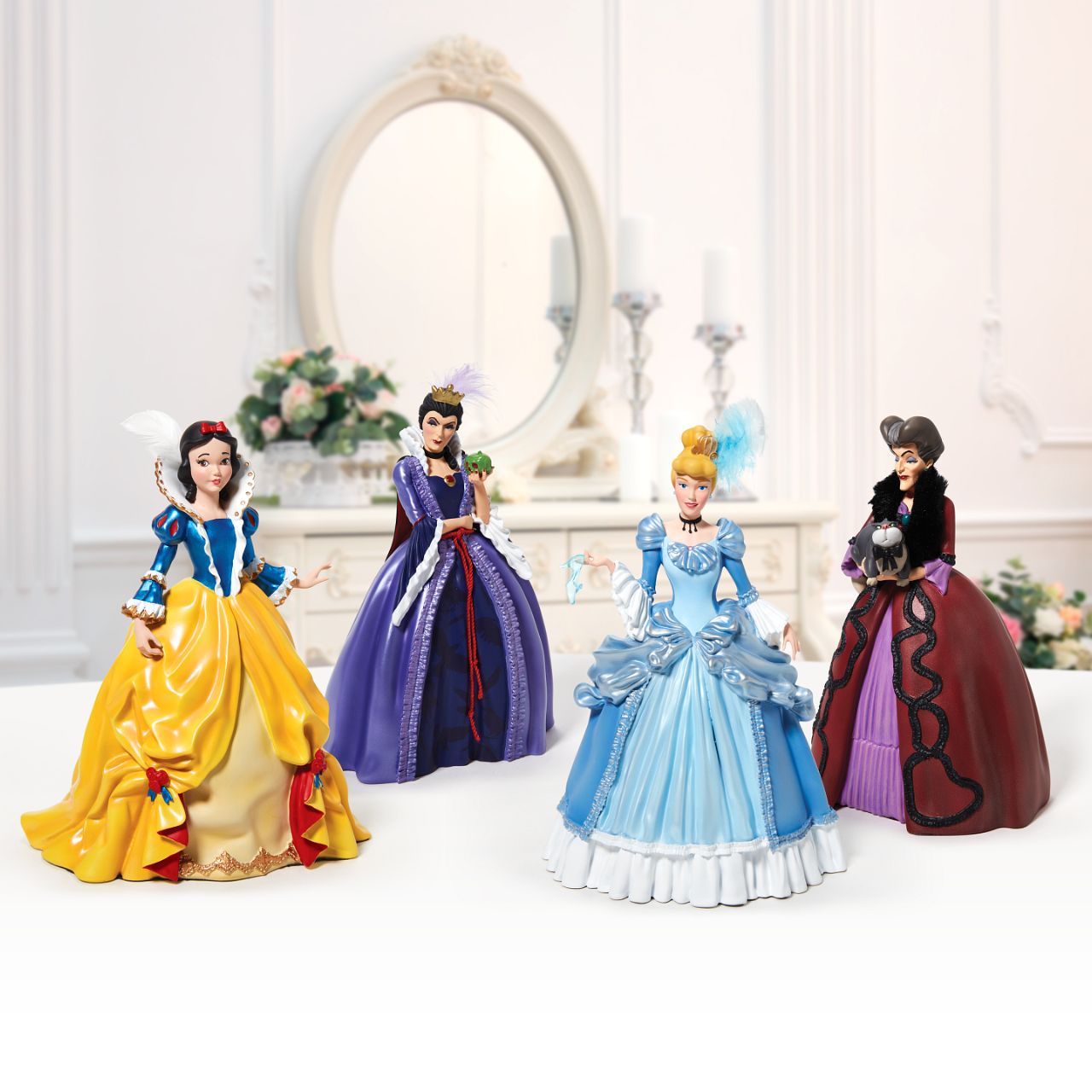 Disney Showcase Lady Tremaine Rococo Figurine  Lady Tremaine Rococo Figurine. Cinderella's Step Mother is made from cast stone. Each piece is hand painted and slight colour variations are to be expected which makes each piece unique. Supplied in branded gift box.