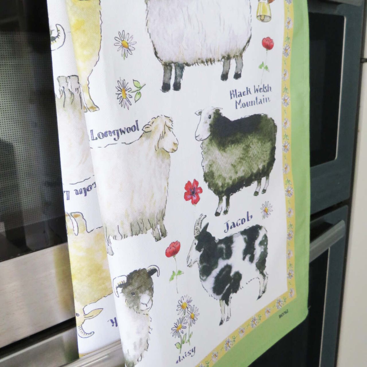 Inspired by our beautiful rural countryside, this hand drawn Cotton Tea Towel is perfect for any lover of farmyard animals. Displaying a variety of adorable Sheep Breeds, complimented by a vibrant green border.