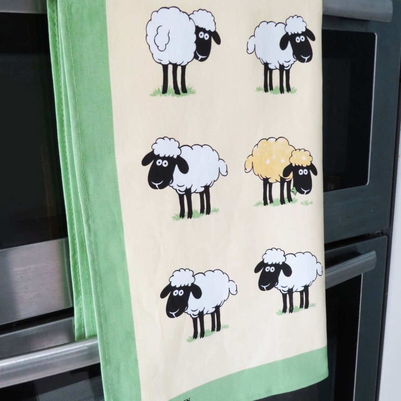 One of our many beautifully designed sheep inspired tea towels, with this special edition being 100% Linen Union in design Sheepish. This beautiful countryside kitchenware accessory includes a variety of hand painted sheep characters with hints of purple, red, blue and more! Complimented with a vibrant light green border and cream background. A great tea towel for any lover of the country!