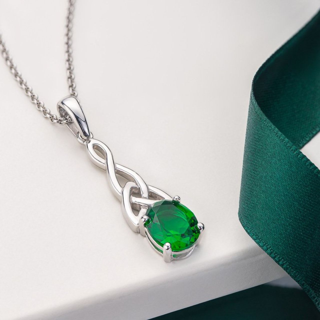 This sterling silver pendant brings both style and substance. The Trinity Knot symbol is deeply meaningful, its lack of ending or beginning representing the eternal nature of the human spirit. The oval-shaped green cubic zirconia is a nod to the Emerald Isle itself. A beautiful piece that stylishly conveys its Irish heritage.