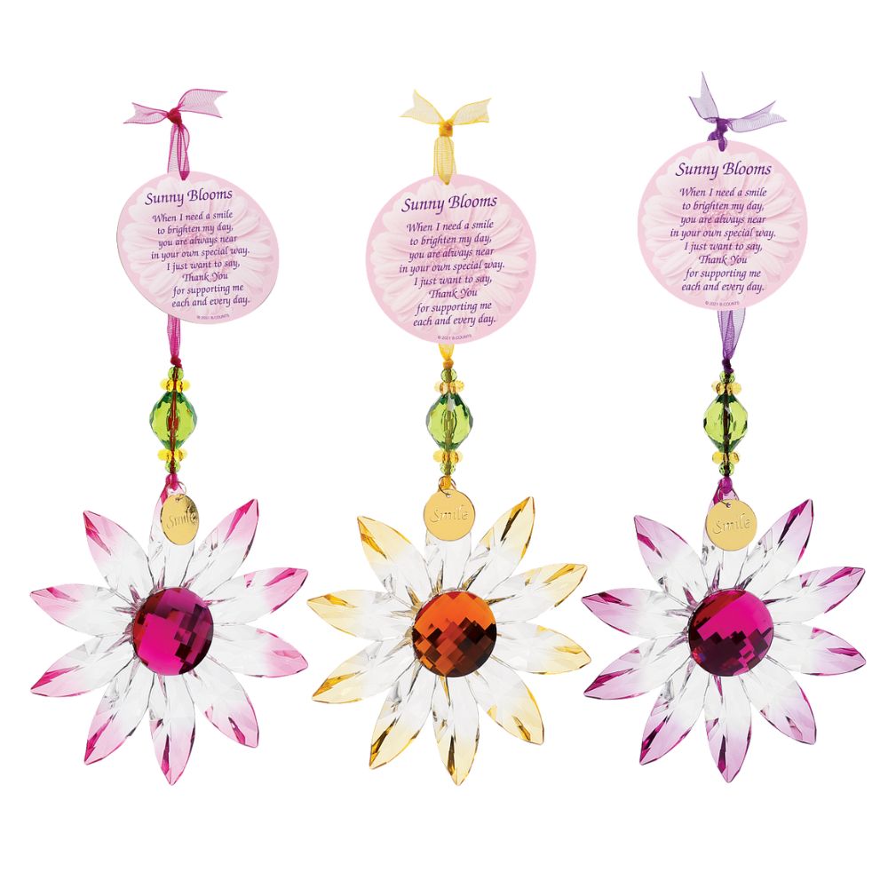 Suncatcher Acrylic Daisy Hanging Ornament Pink  Hung on a colour matching organza ribbon, this colourful Daisy is the perfect gift for a loved one. Comes with a poem tag and token attached. Can be displayed with others from the acrylic collection.