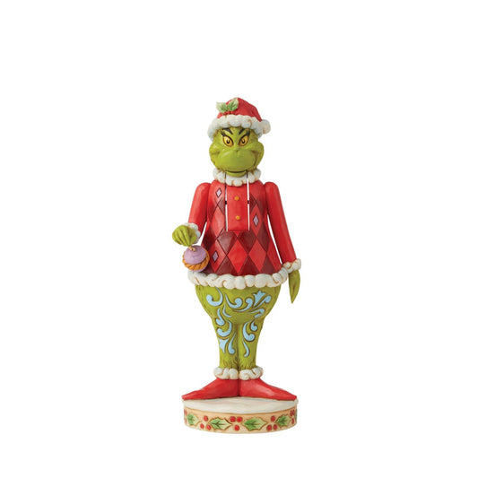 Marrying two beloved holiday figures, Jim Shore creates a Grinch Nutcracker that captures the grump in all his glory.