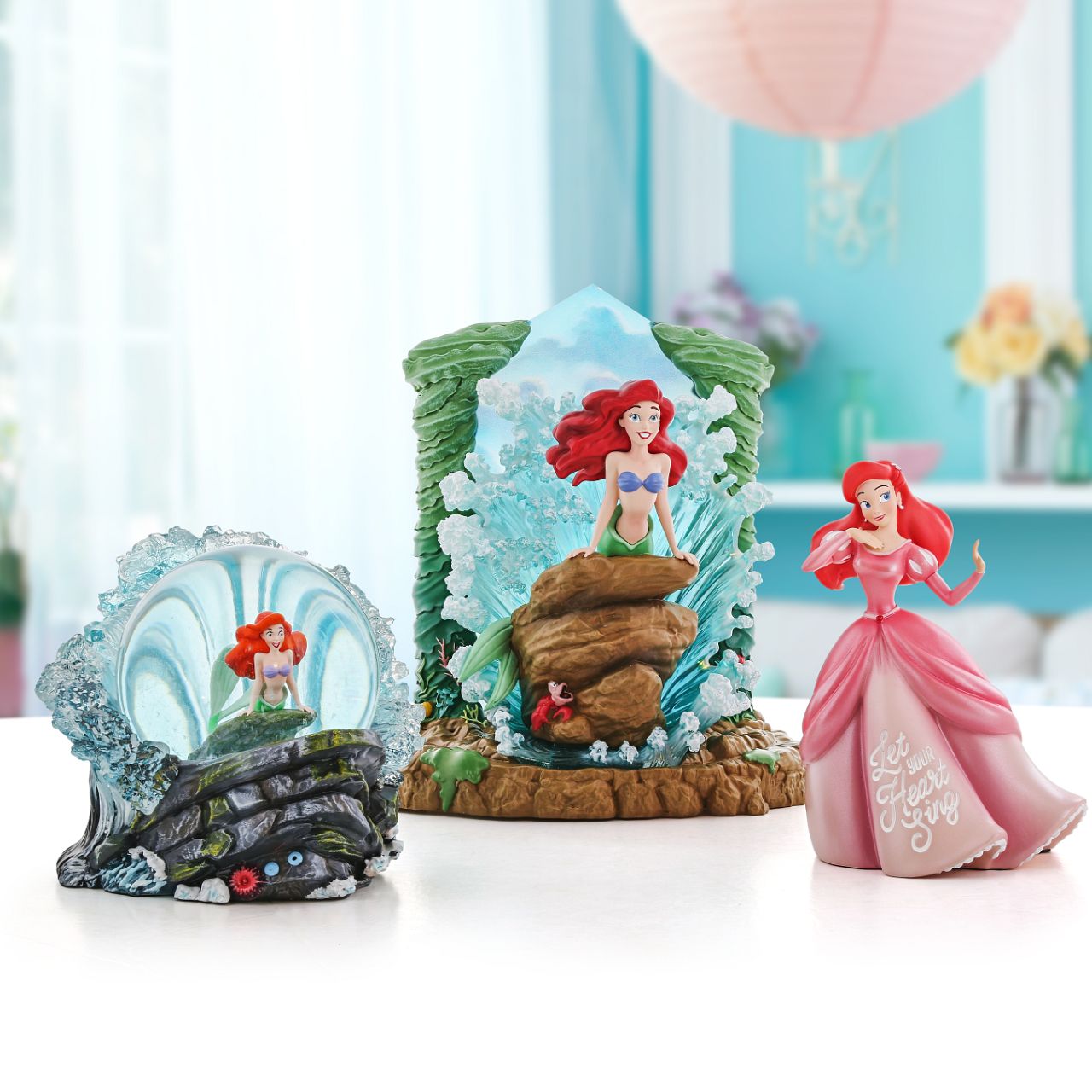 The Little Mermaid light up figurine. The figurine is made from cast stone. Each piece is hand painted and slight colour variations are to be expected which makes each piece unique. Supplied in branded gift box. 