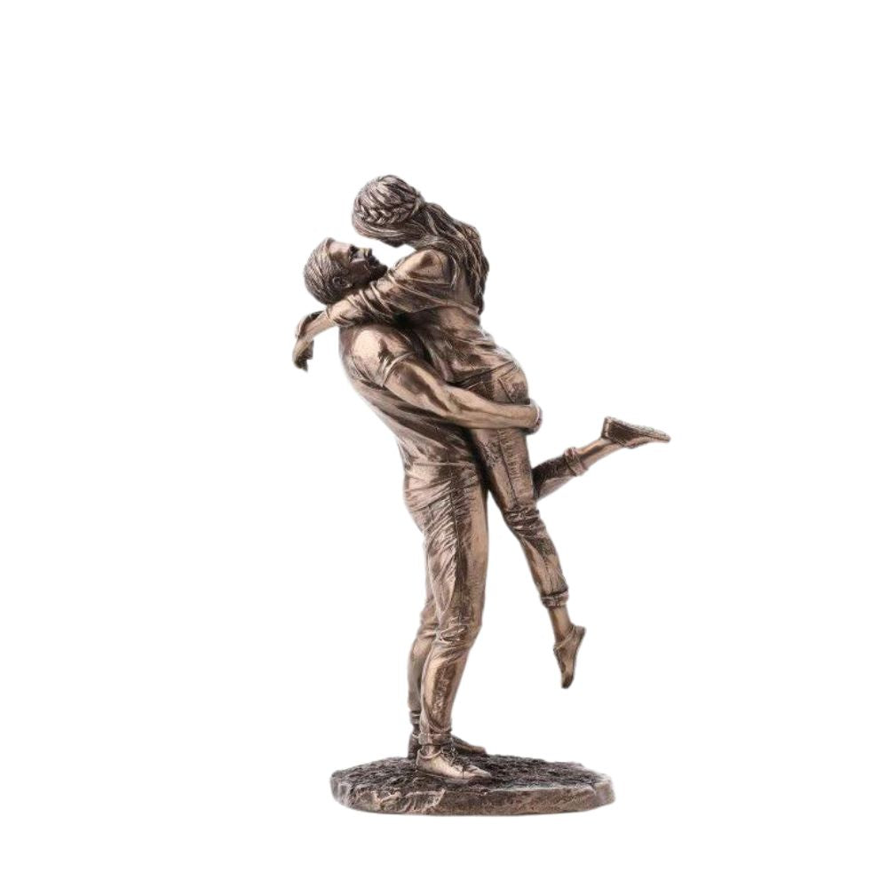 The Promise by Genesis Ireland  A beautiful bronze coloured statue of a couple in a loving embrace.  Perfect for art lovers or for an occasional gift such as a engagement or anniversary gift.