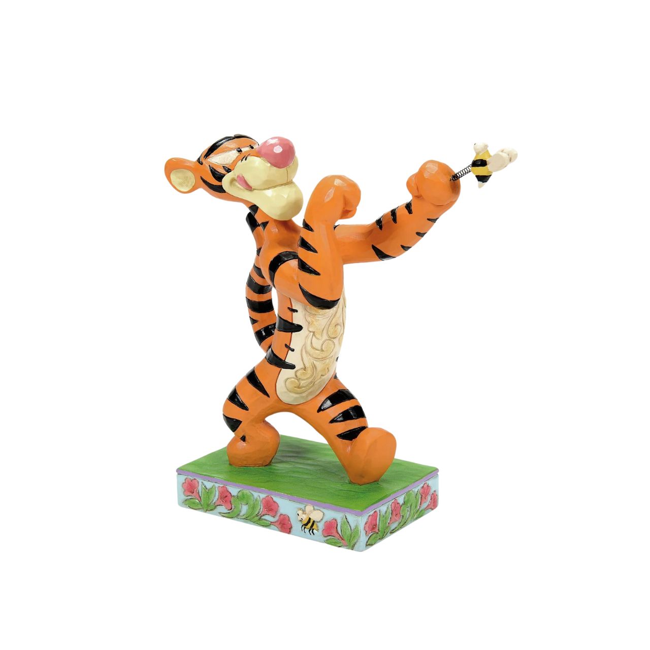 With fierce determination, Tigger fights a bumblebee in this whimsical Winnie the Pooh design by Jim Shore. With the artist's iconic rosemaling and charming craftsmanship this playful piece makes an alluring addition to your home décor.