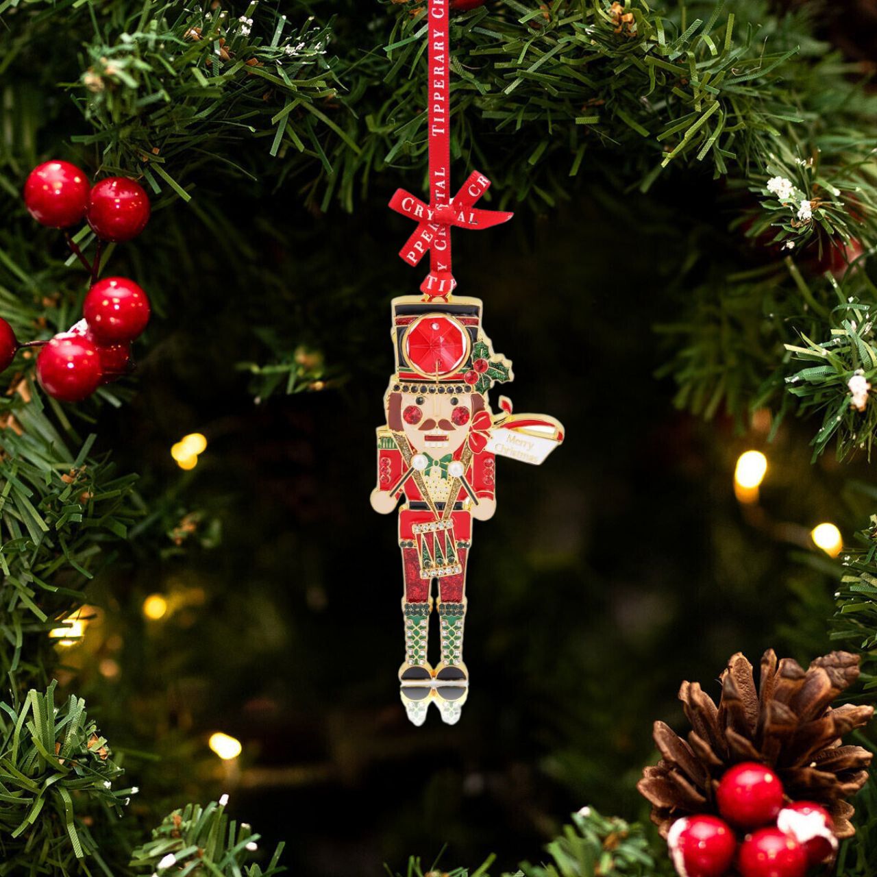 Add an elegant touch to your holiday décor with the Tipperary Gem Christmas Decoration - Nutcracker. This beautiful decoration features a sparkling gem design, adding a festive and luxurious feel to any room. Made by Tipperary, renowned for their high-quality products, this Nutcracker will be a charming addition to your Christmas collection.