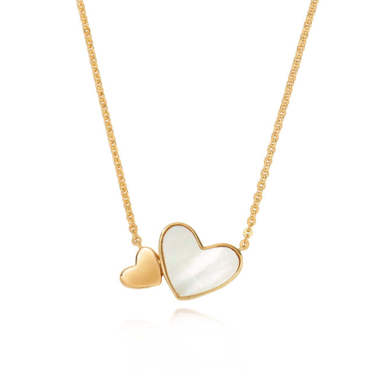 Embrace elegance with the Tipperary Heart Pendant in gold. The Mother of Pearl inset adds a touch of sophistication to this autumn 2024 piece. Make a statement with this timeless and luxurious pendant.