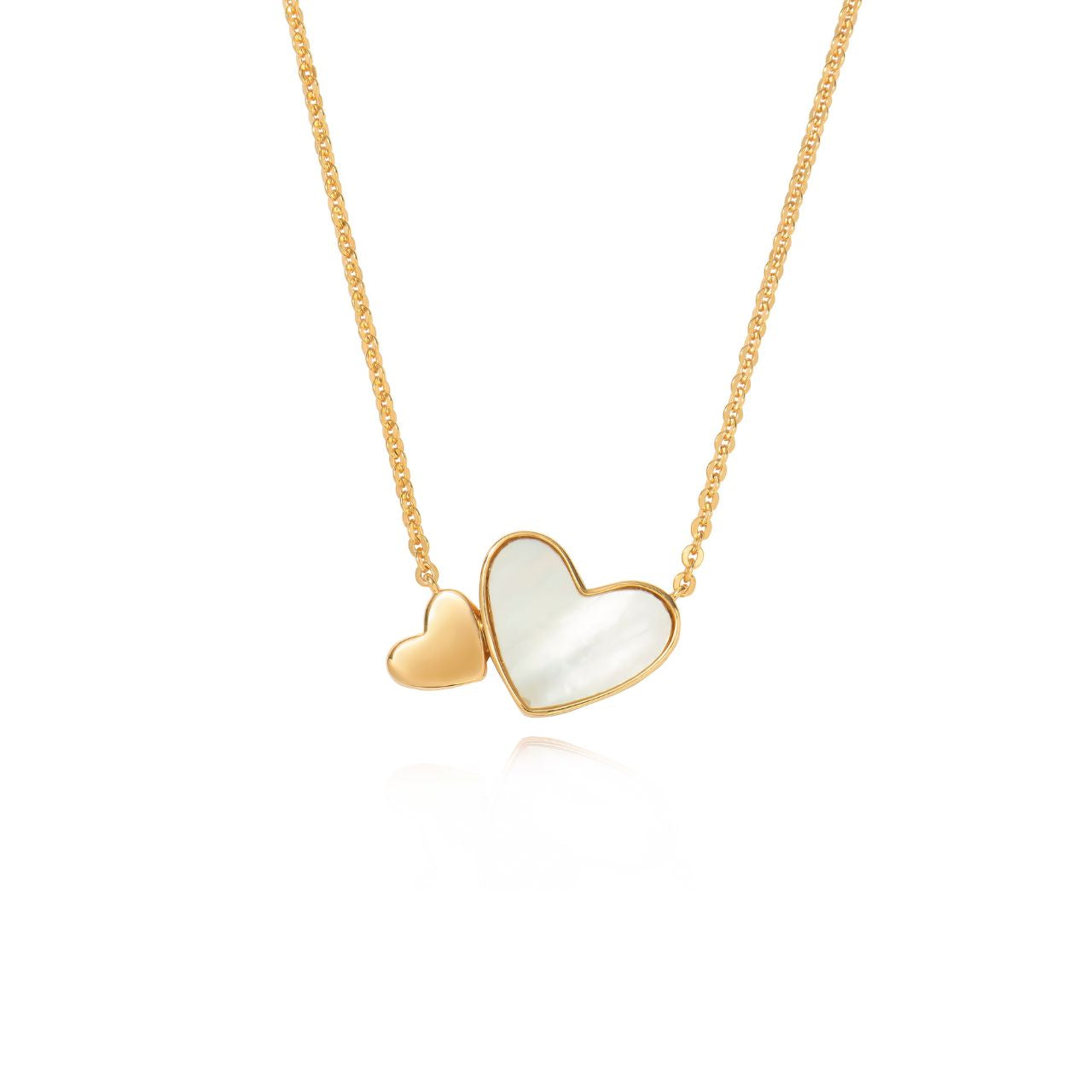 Embrace elegance with the Tipperary Heart Pendant in gold. The Mother of Pearl inset adds a touch of sophistication to this autumn 2024 piece. Make a statement with this timeless and luxurious pendant.