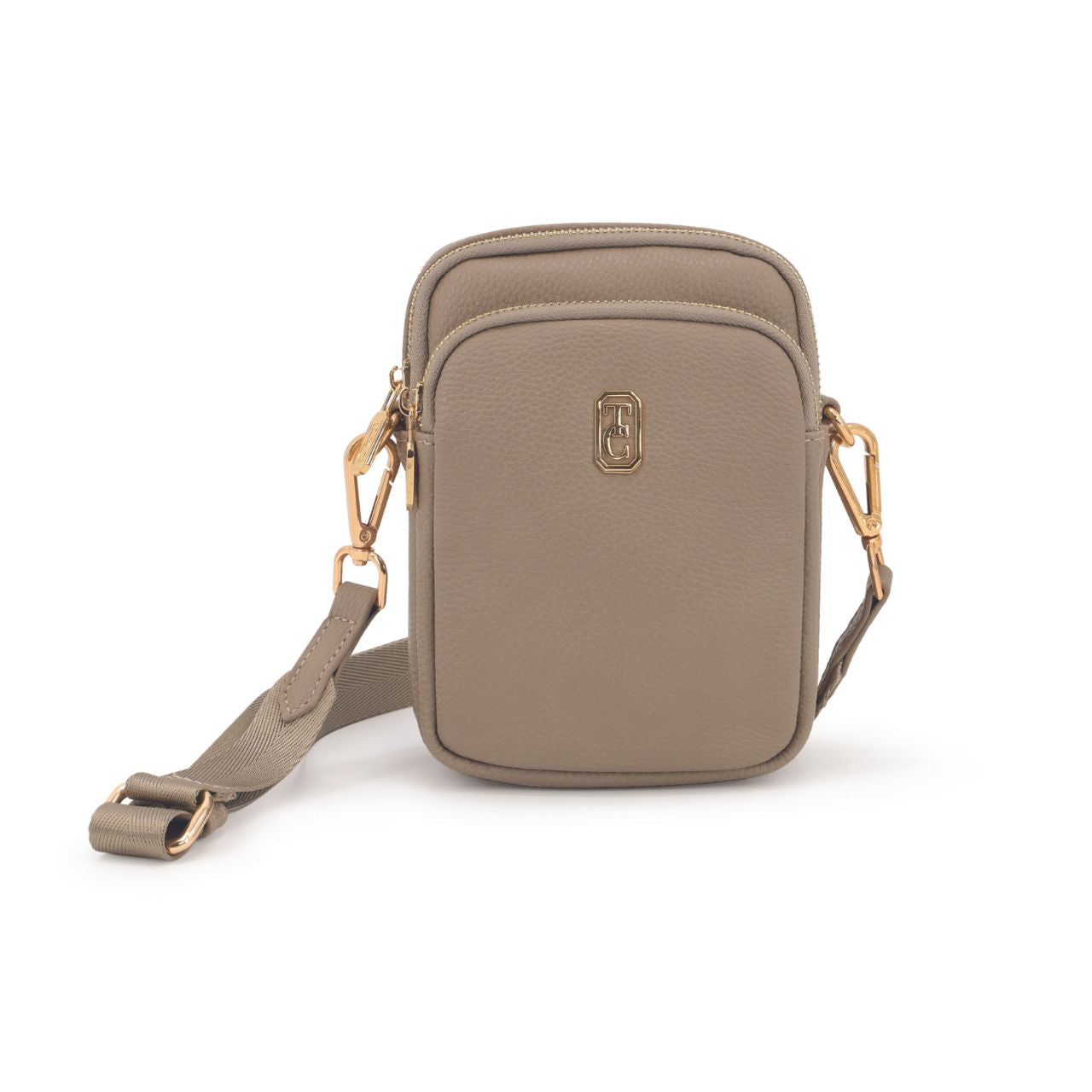 The Tipperary Naples Mini Cross Body Bag in Greige is a stylish and functional addition to any wardrobe. Crafted by Tipperary, this bag offers a compact size that is perfect for on-the-go use. With its chic Greige colour, this bag is sure to add a touch of sophistication to any outfit. Update your style game with the new 2024 version.