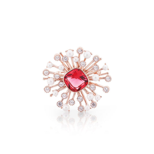 This Tipperary brooch features a beautiful ruby and pearl burst design, accented with sparkling CZ gems. Handcrafted with precision and care, this brooch adds a touch of elegance and sophistication to any outfit. Make a statement with this stunning piece of jewellery.