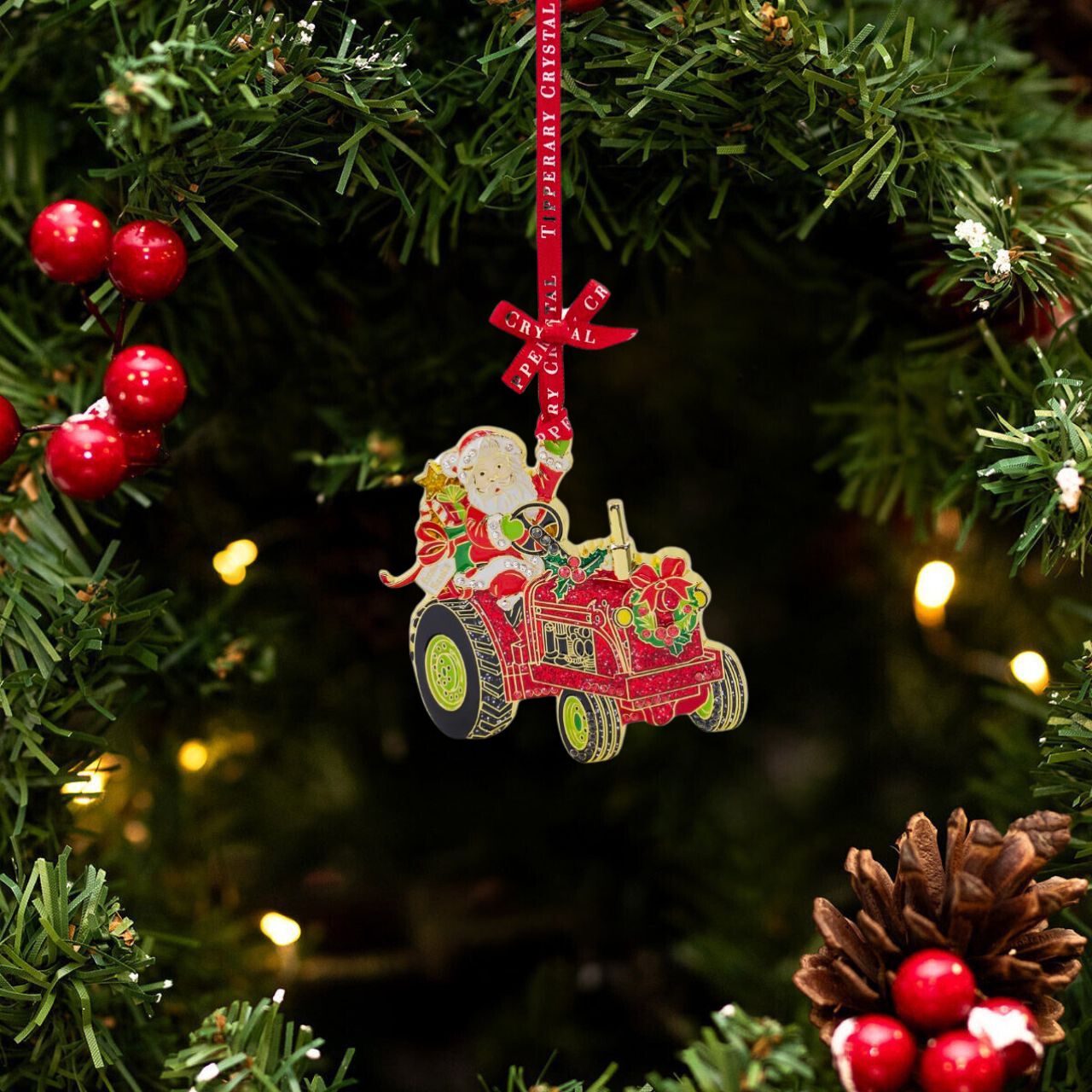 This Christmas, add a touch of sparkle to your holiday décor with the Tipperary Santa Tractor Sparkle Decoration. Expertly crafted with precision and care, this decoration features a charming Santa driving a tractor adorned with glittering details. Bring some festive cheer into your home with this delightful decoration.