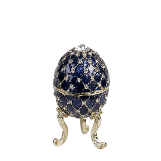 Painted in a resplendent blue colour with stunning gold and crystal patterns, this trinket box is a wonderful ornament to complement a mantelpiece, bookcase or cabinet.