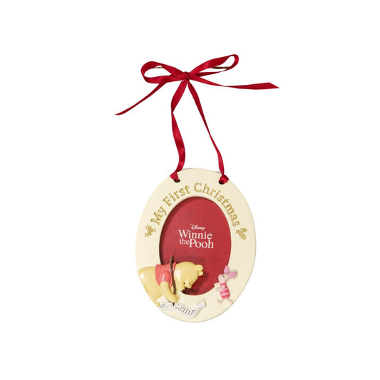 Give a precious 1st Christmas photo the perfect place to shine with this adorable Winnie the Pooh hanging photo frame. From the Winnie The Pooh Baby's First Christmas collection by Disney