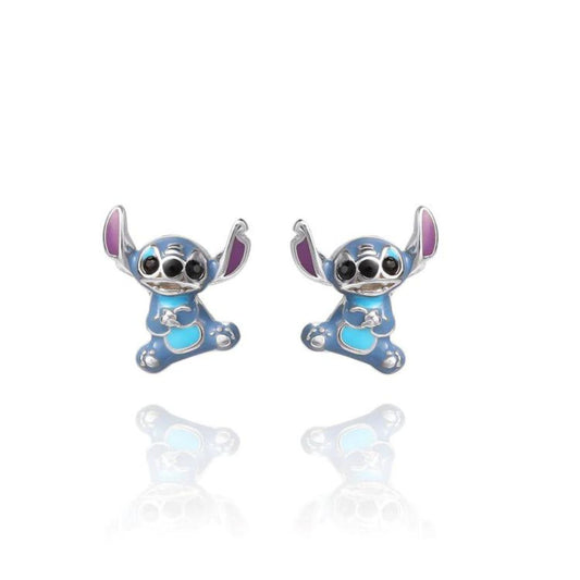 Disney Lilo and Stitch Sterling Silver 3D Blue Enamel Earrings  These adorably crafted Disney Stitch earrings are crafted from sterling silver with a blue enamel finish, lending a touch of whimsy to any ensemble.