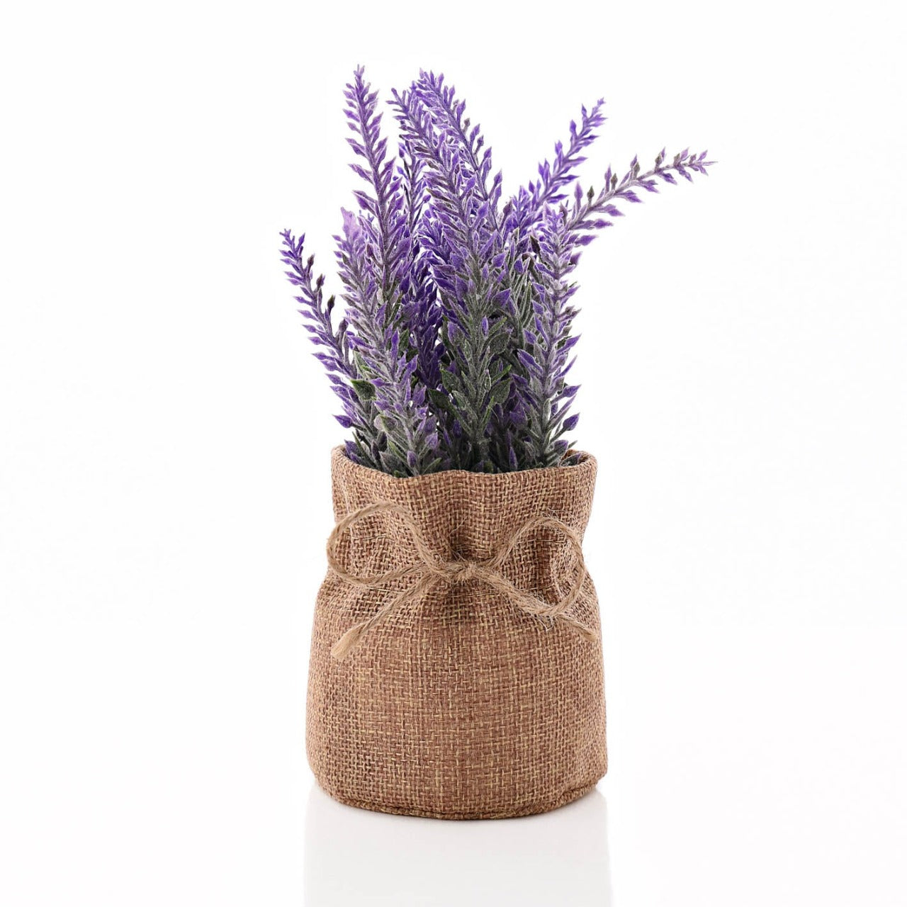 Faux Lavender Plant In Hessian Bag 19 cm  This lavender plant would make a stylish and rustic gift for any trendsetters in your life this spring. The adorable hessian sack is unique feature that would look beautiful against any interior, a gorgeously simple gift or homeware option this Spring.