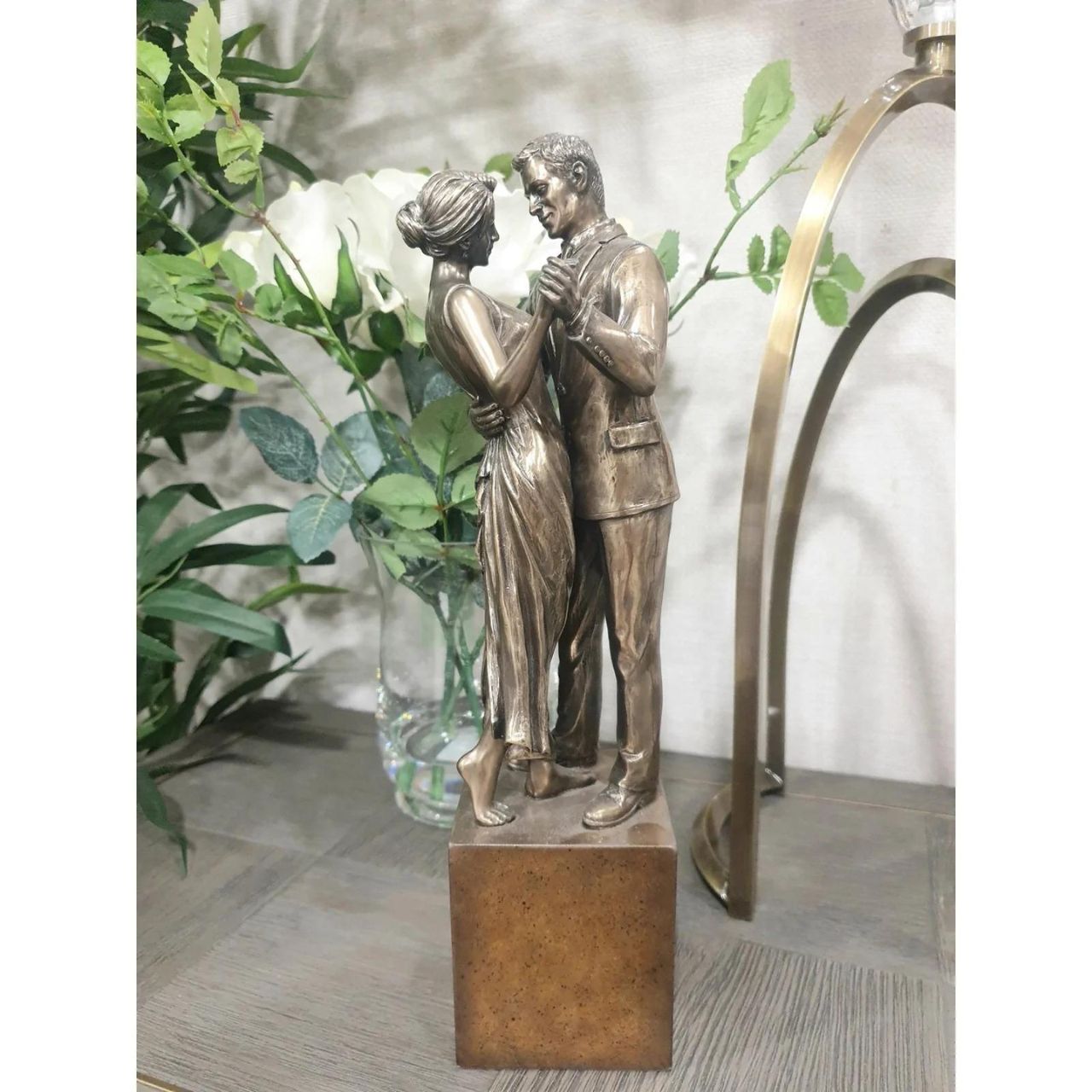 Genesis First Dance  Genesis Wedding: This beautiful piece, First Dance, depicts the unity and magic of love in a perfect partnership, beautifully crafted. The base is amber bronze in colour.