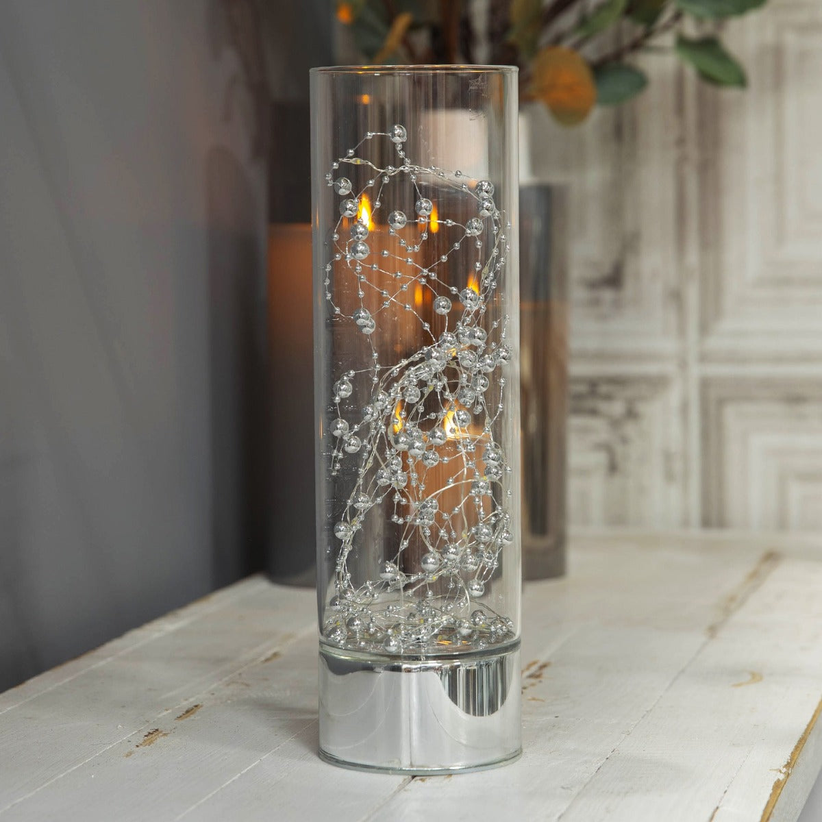 HESTIA® LED Tube Light 30cm  Bring some contemprary shimmer to your home with this elegant silver glass light tube. From the Silver Luxe collection by HESTIA® - unparalleled glamour, style and elegance in contemporary home and gift.