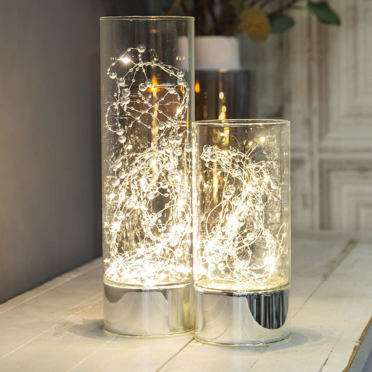 HESTIA® LED Tube Light 30cm  Bring some contemprary shimmer to your home with this elegant silver glass light tube. From the Silver Luxe collection by HESTIA® - unparalleled glamour, style and elegance in contemporary home and gift.