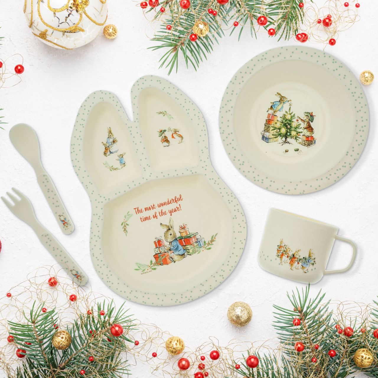 Beatrix Potter Peter Rabbit Christmas Dinner Set  Introducing this brand new at home with Peter Rabbit collection. There's nothing quite like a fun Peter Rabbit motif to entice those little tummies to clear their plates. Make mealtimes fun and practical with this Christmas dinner set.