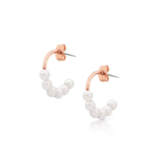 Romi Dublin Rose Gold Pearl Small Earrings  Simple and understated this collection has a contemporary and sleek look that will allow you to accessorise with any outfit.