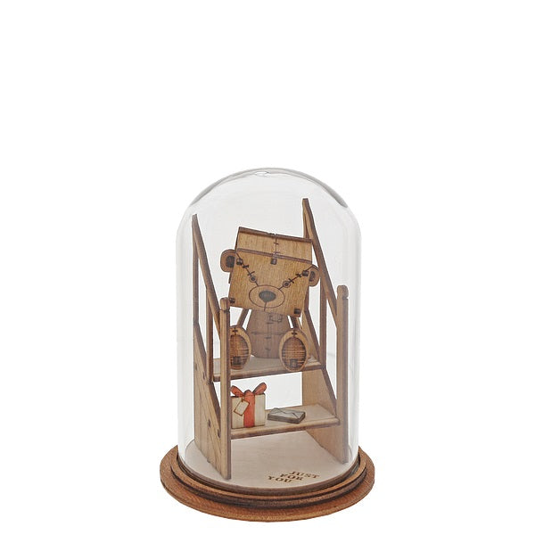 To Someone Special Figurine - The Little Wooden Bear  The Little Wooden Bear. This little bear will make you smile, with sentiments to suit every occasion. This glass dome decoration encases our favourite little bear, adorned with a giant Birthday gift.