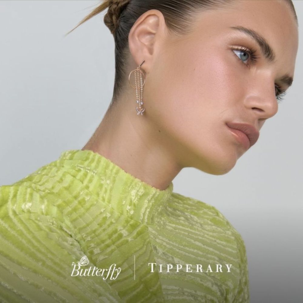 Tipperary Crystal Butterfly Circle Chain Earrings  Drawing inspiration from urban garden, the Tipperary Crystal Butterfly collection transforms an icon into something modern and unexpected. Playful and elegant, this collection draws from the inherent beauty of the butterfly.