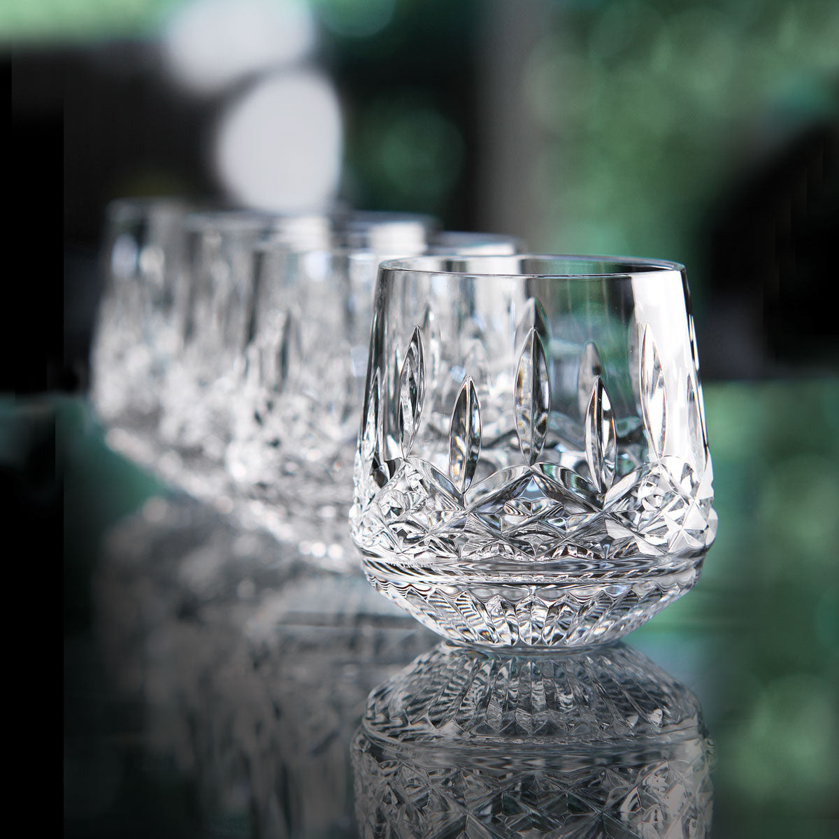 Waterford Crystal Lismore Whiskey Glass Set of 4  The Waterford Lismore pattern is a stunning combination of brilliance and clarity. You could honor Lismore's Irish roots serving drams in these Lismore Old Fashioned glasses, or use them to serve spirits 'on the rocks.'